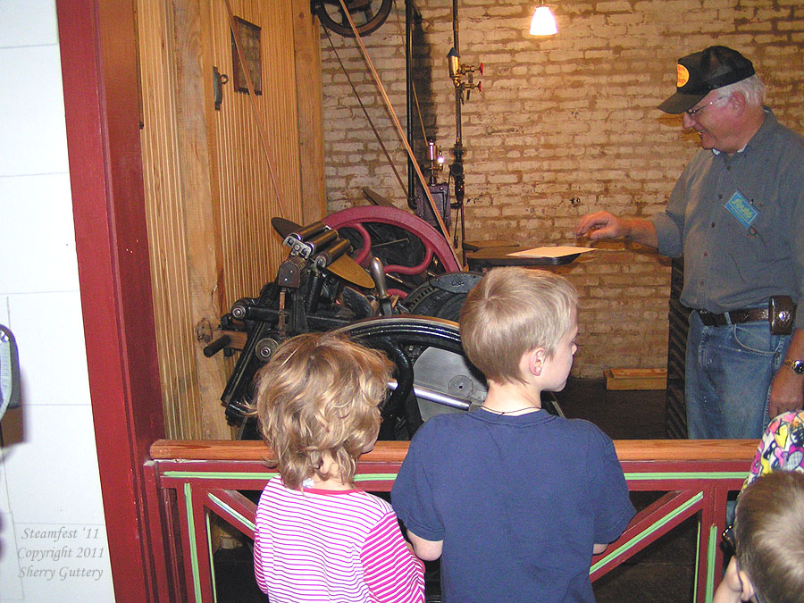 Steam powered printing press in operation -  Soule' Steamfest 2011