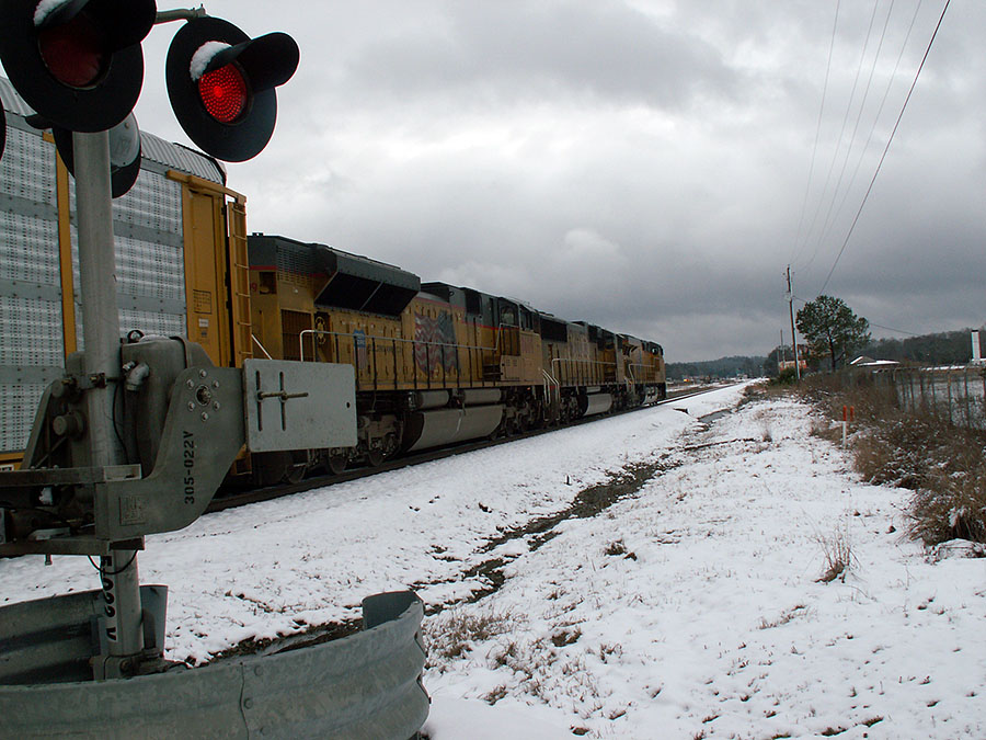 Snow on Meridian Speedway - Meridian, MS High speed freight rail