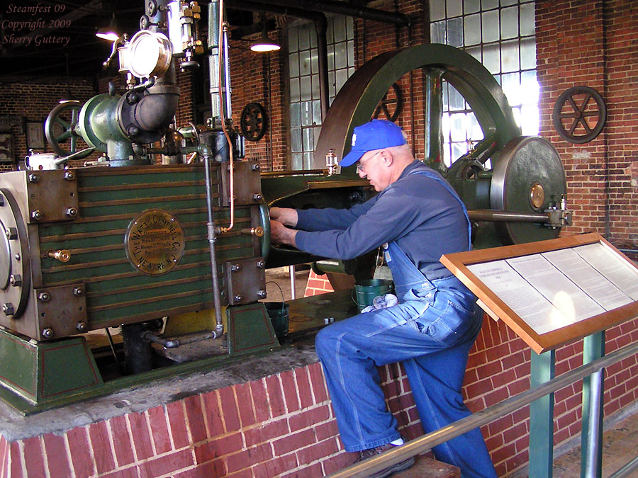 Watt Campbell "Corliss" engine - checking and lubing the rod packing. Soule Live Steam Festival Meridian, MS 2009